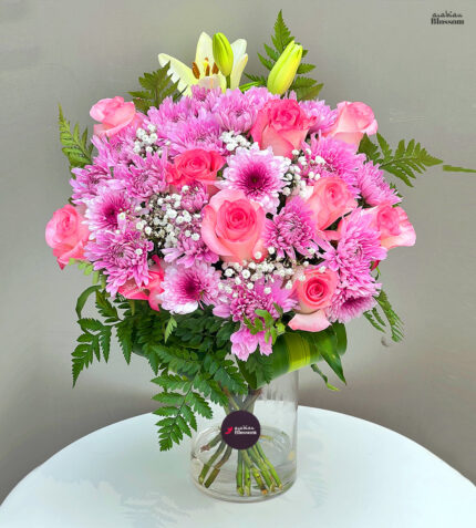 The Magical Bloom - Pink Roses, Chrysanthemums & White Lilies in Glass Vase for Anniversaries & Elegant Gifting