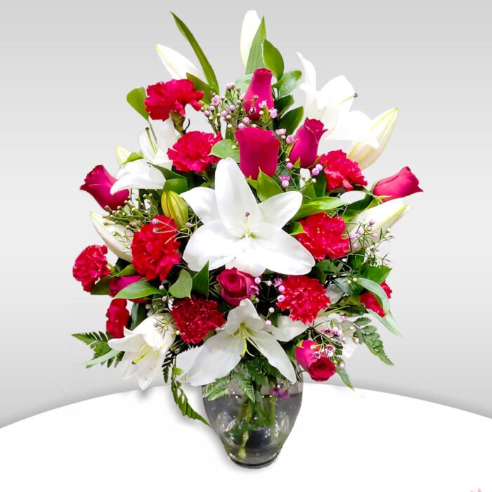White Lilies, Red Carnation and Red Roses In a Premium Vase