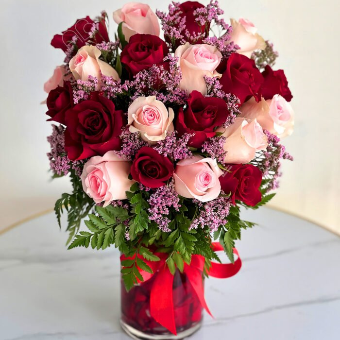 20 Red & Pink Roses In a Petals Filled Vase